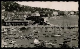 Tarjeta postal circulada de vista panorámica del Puerto y la Playa de la Croisette de Cannes remi...