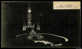 Tarjeta postal de vista panorámica nocturna de la Basílica del Rosario de Lourdes iluminada, edic...