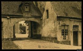 Tarjeta postal de la Puerta de entrada al Beguinaje de Brujas editada por Ernest Thill para Nels ...