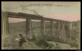 Tarjeta postal del paso de un tren sobre el Viaducto de Garabit editada por Béguin en Saint-Gérand